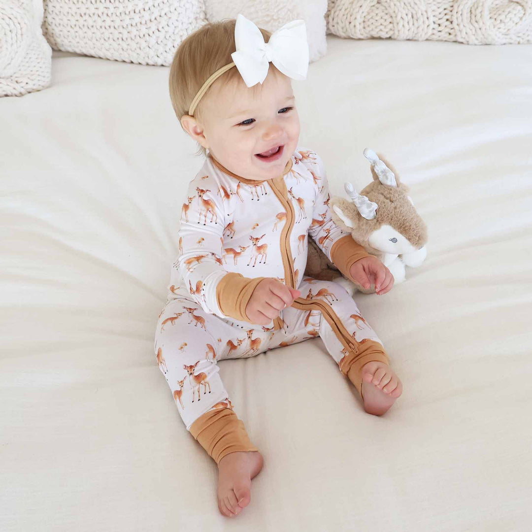 baby girl wearing deer bamboo viscose convertible zip romper 