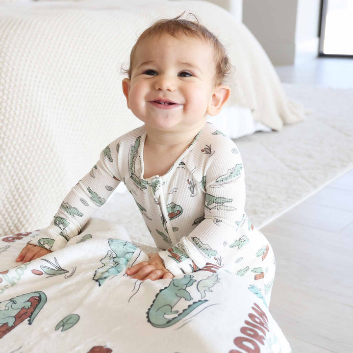 tan and green alligator convertible zip romper for baby boys with flip mitts and footies 