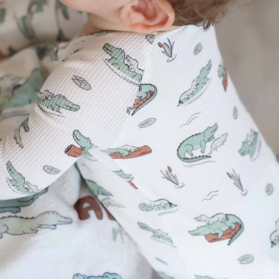 swamp themed pajama romper for babies 