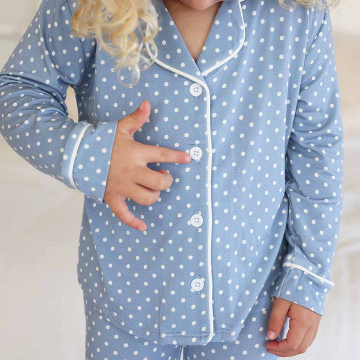 close up of girl's lounge set long sleeve with polka dots 