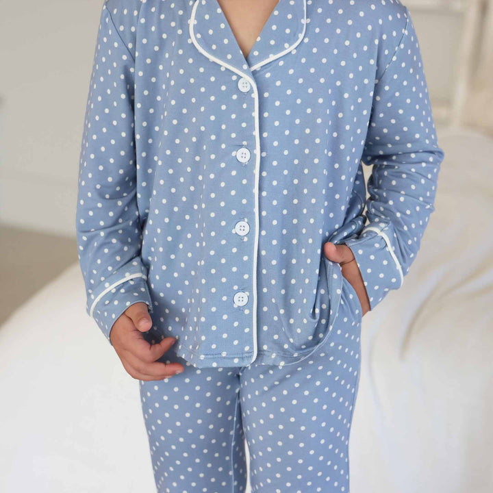 closeup shot of dusty blue girl's long sleeve lounge set with white polka dots made of bamboo viscose 