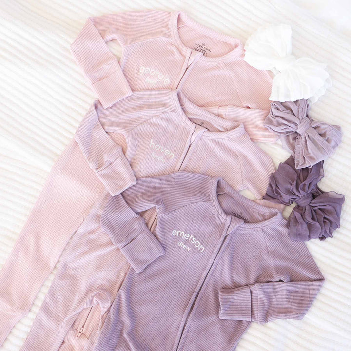 pink and purple bamboo waffle convertible zip rompers for girls 