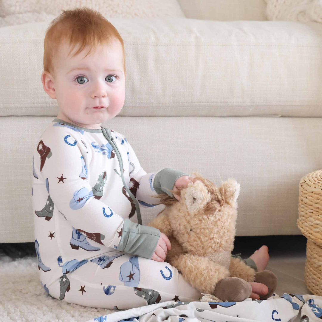 green and blue cowboy boot pajama romper 