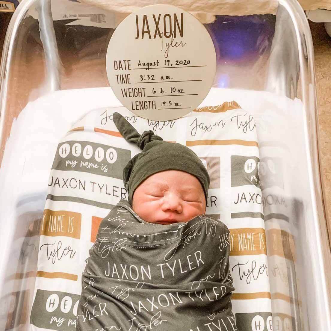 hello my name is swaddle green and orange 