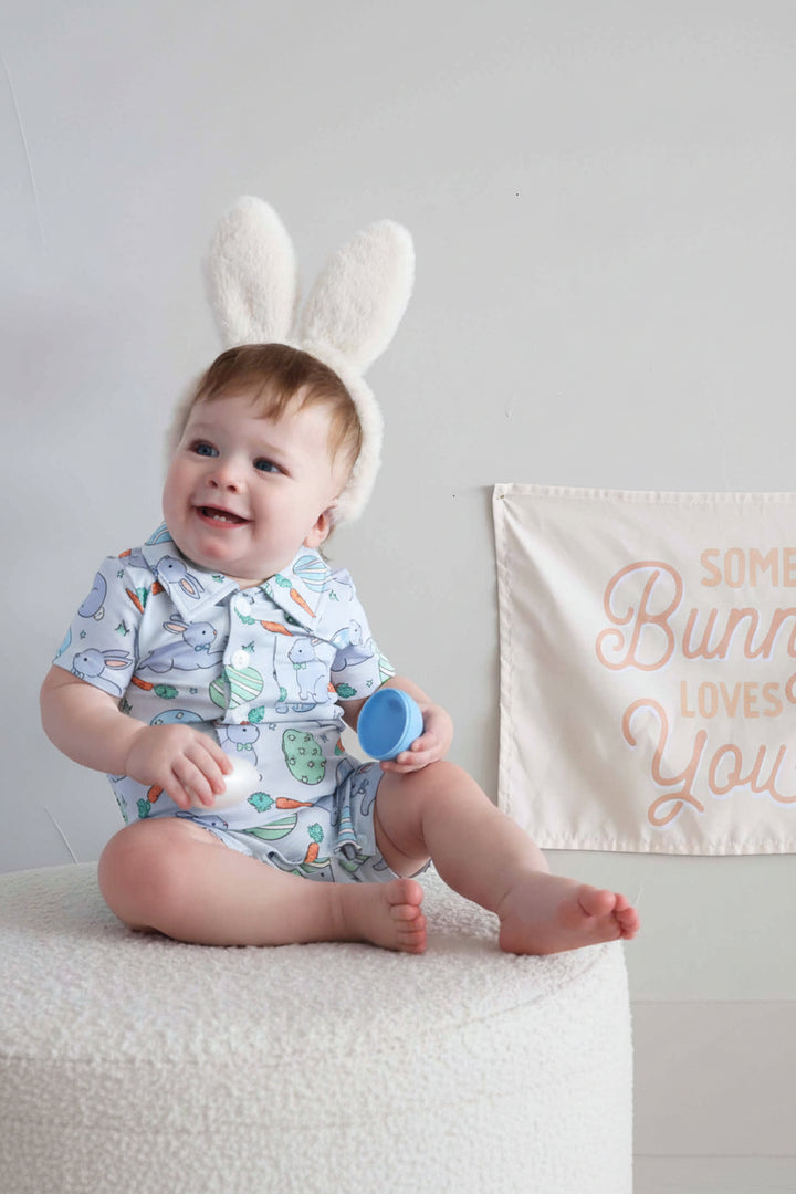 hoppy spring blue short sleeve button romper for baby boys 