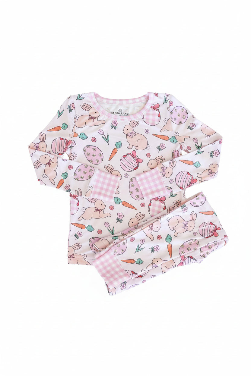 easter bamboo pajama set for girls with pink easter bunnies, eggs, carrots and gingham trim 