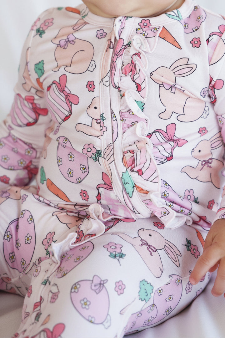 closeup of pink hoppy spring ruffle zipper footie for girls easter 