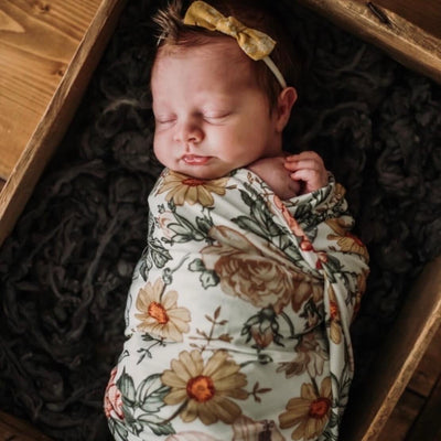 rust and yellow floral oversized swaddle blanket