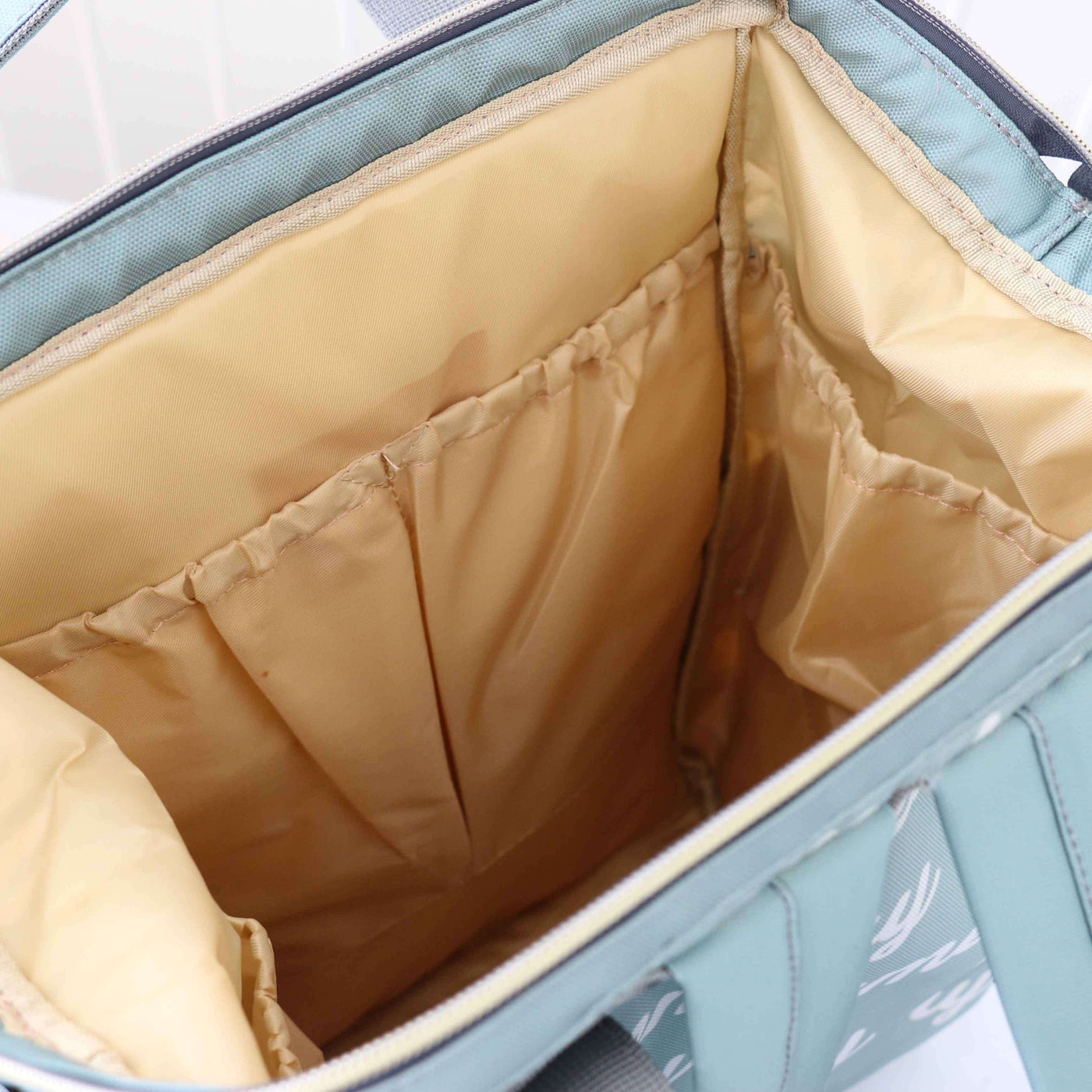 diaper bag backpack tan interior 