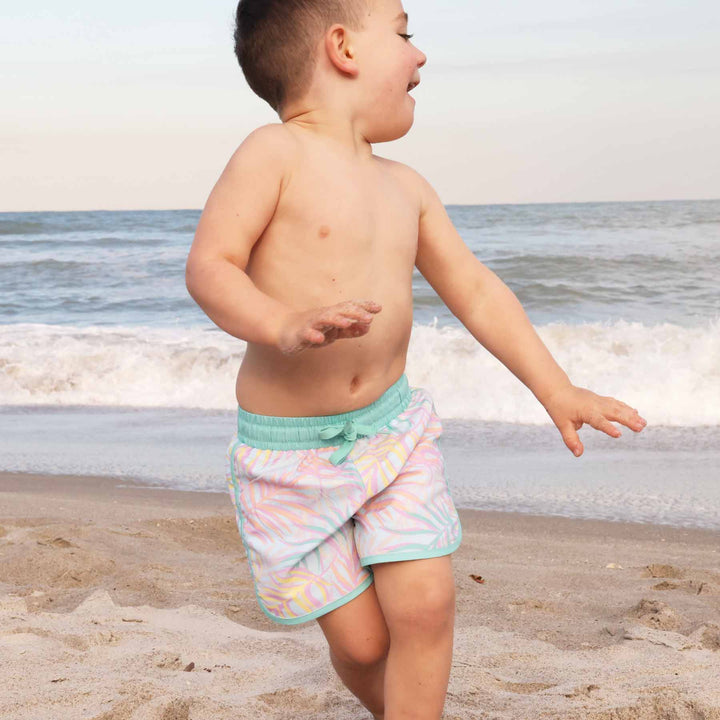 boys' swim trunks with pastel palm leaves and mint green detail - perfect for summer fun - caden lane