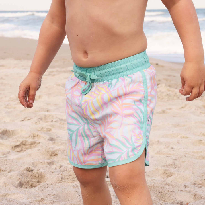 boys' swim trunks with pastel palm leaves and mint green detail - ideal for beach days - caden lane