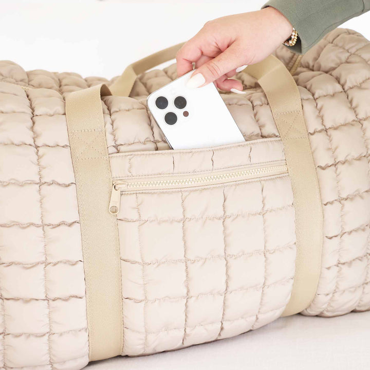 women's tan duffel bag 