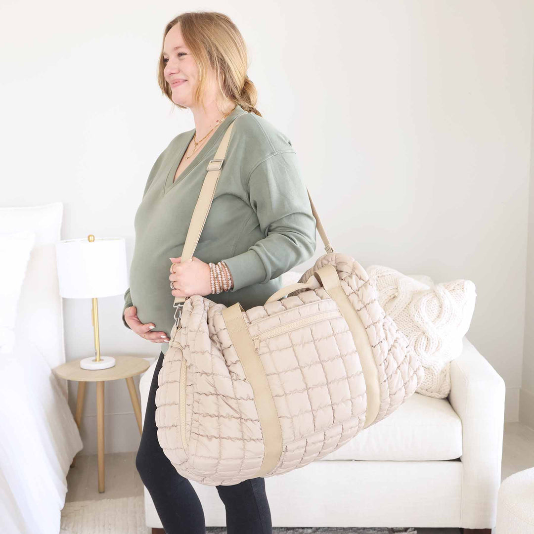 tan quilted duffel bag 