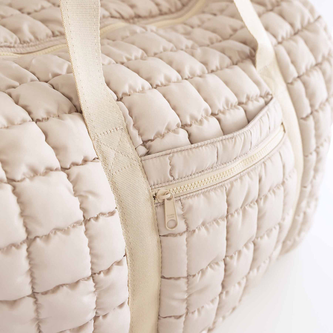 tan quilted weekender bag 
