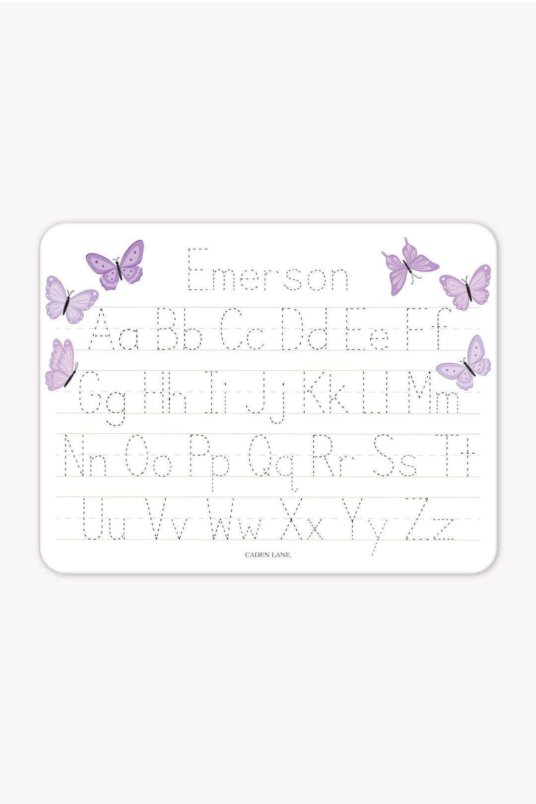 Flat lay of a personalized Caden Lane Lavender Wings alphabet whiteboard, showing purple butterflies and tracing letters with custom name