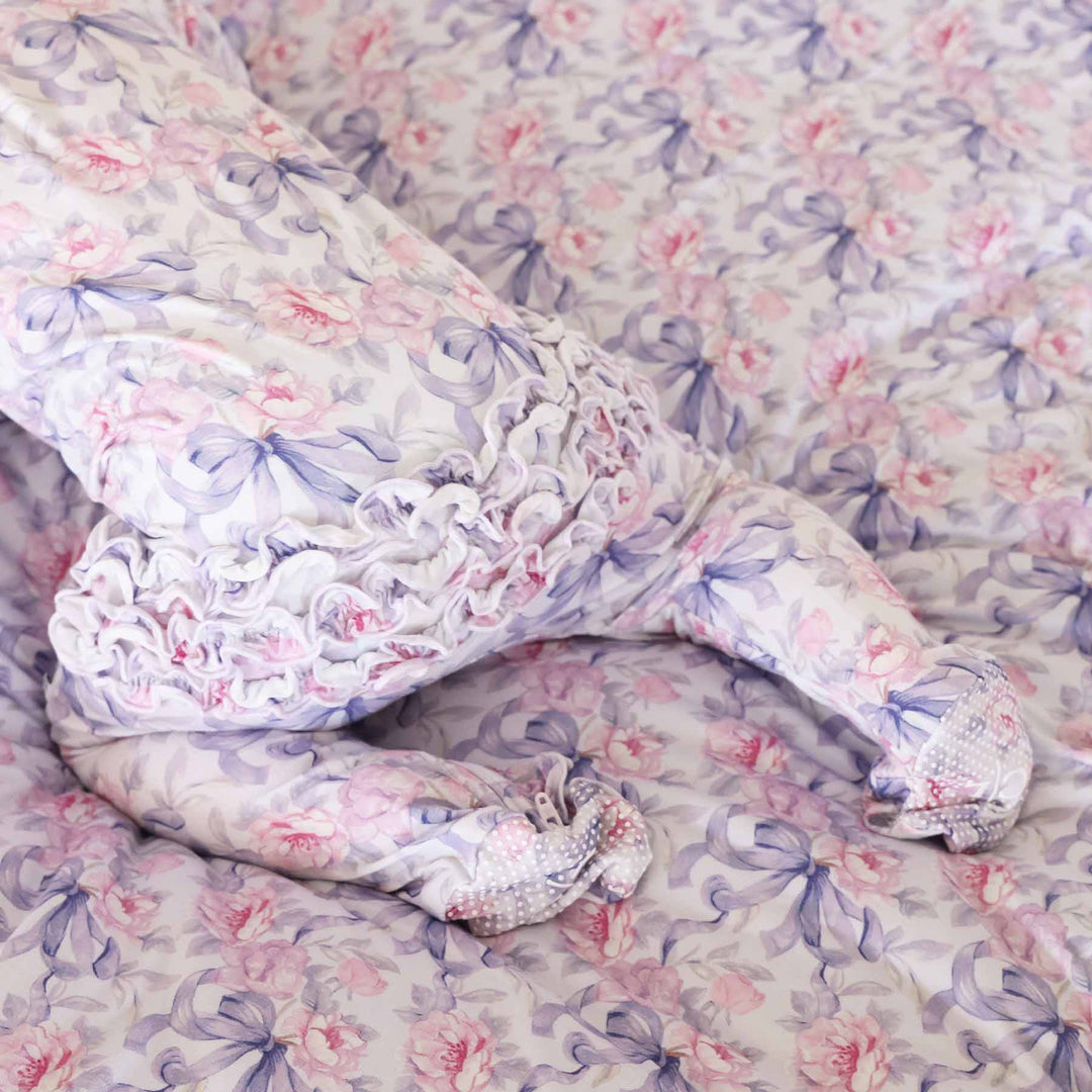 back of leighton's lavender ruffle footie