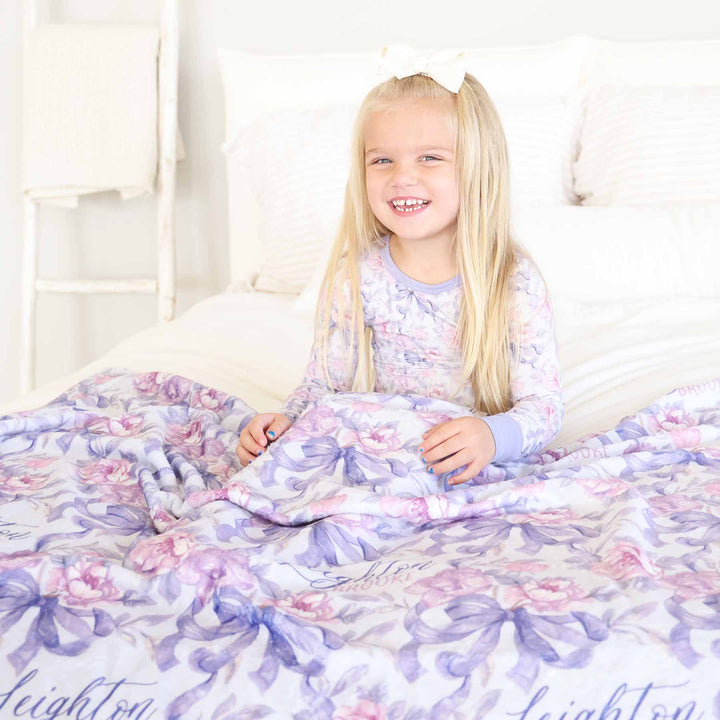 girls personalized blanket with pink flowers and purple bows 