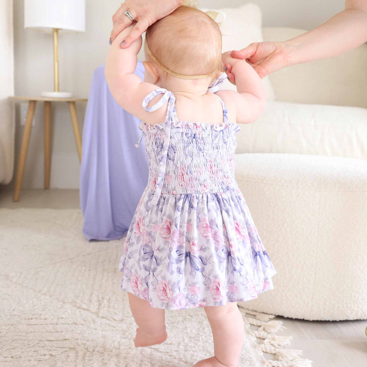 leighton's lavender smocked twirl bodysuit 