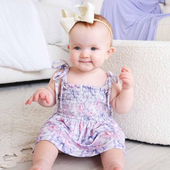 bow spaghetti strap shoulder smocked casual bodysuit for babies leighton's lavender