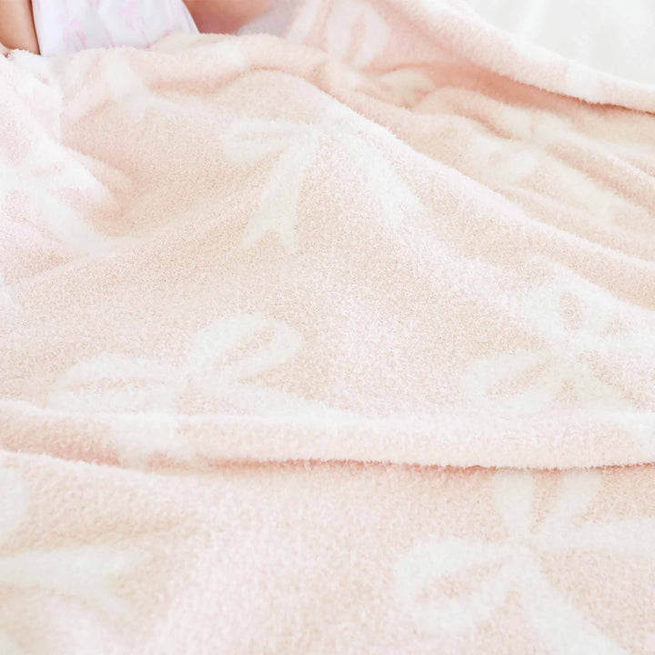 light pink bow blanket 