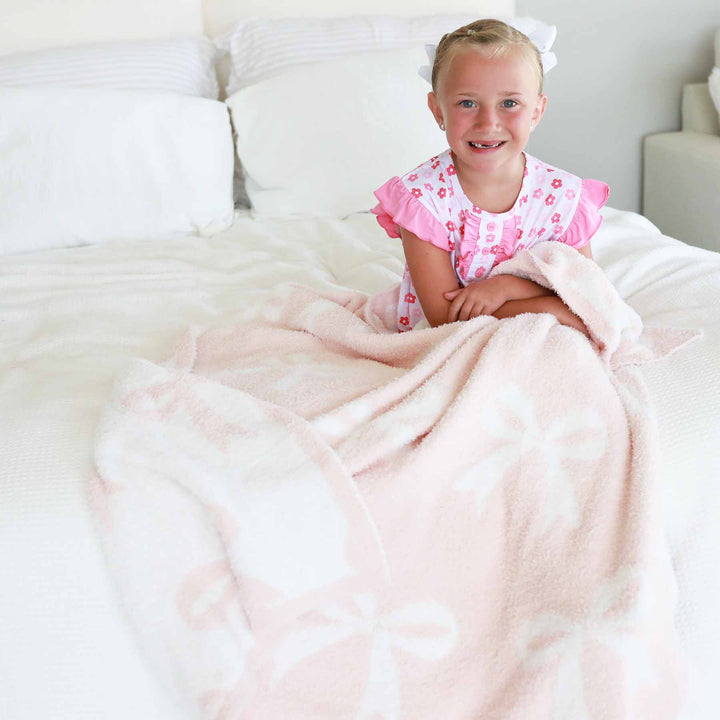 light pink bow cuddlelane blanket 