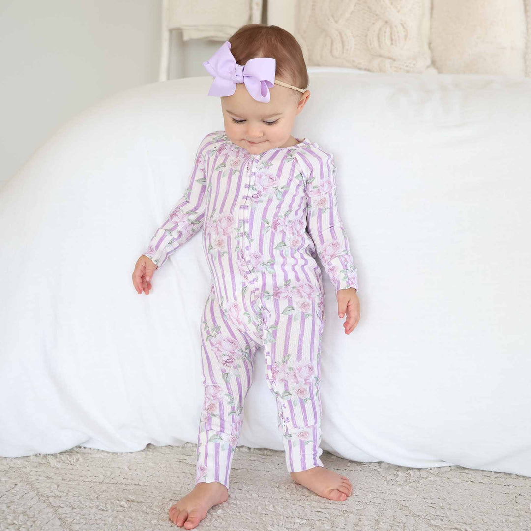 lila's lilacs convertible zip romper made from bamboo waffle fabric with matching lilac ribbon bow headband 