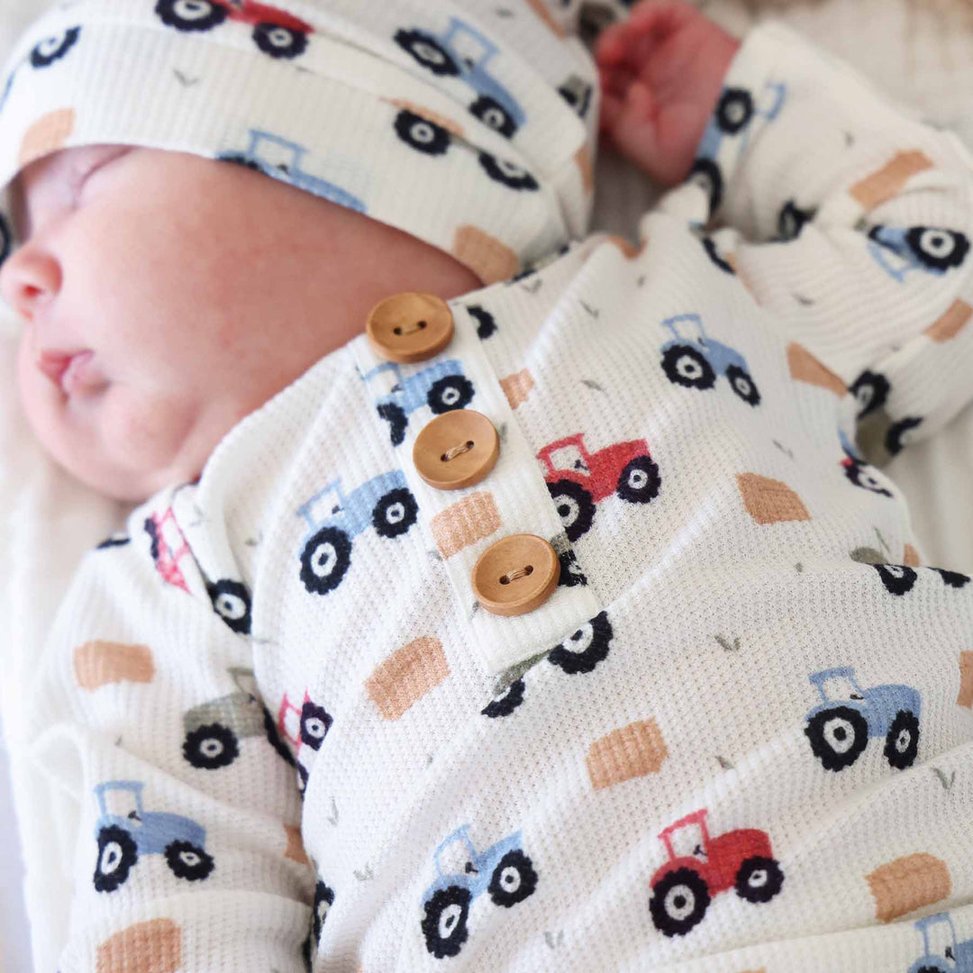 baby gown with colorful tractors 