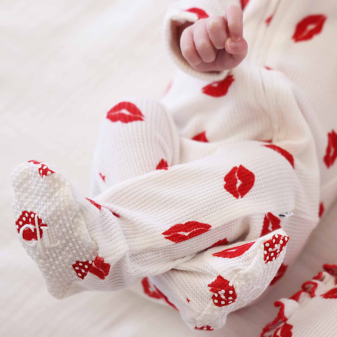 bamboo waffle knit footie pajama for babies with red lips