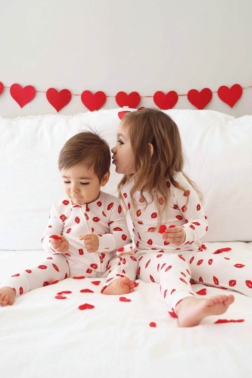 valentine's day sibling matching pajamas with red lips 