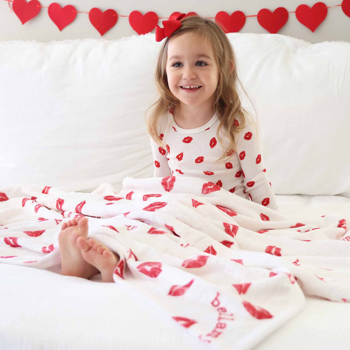 personalized blanket for kids that is white with red lips 