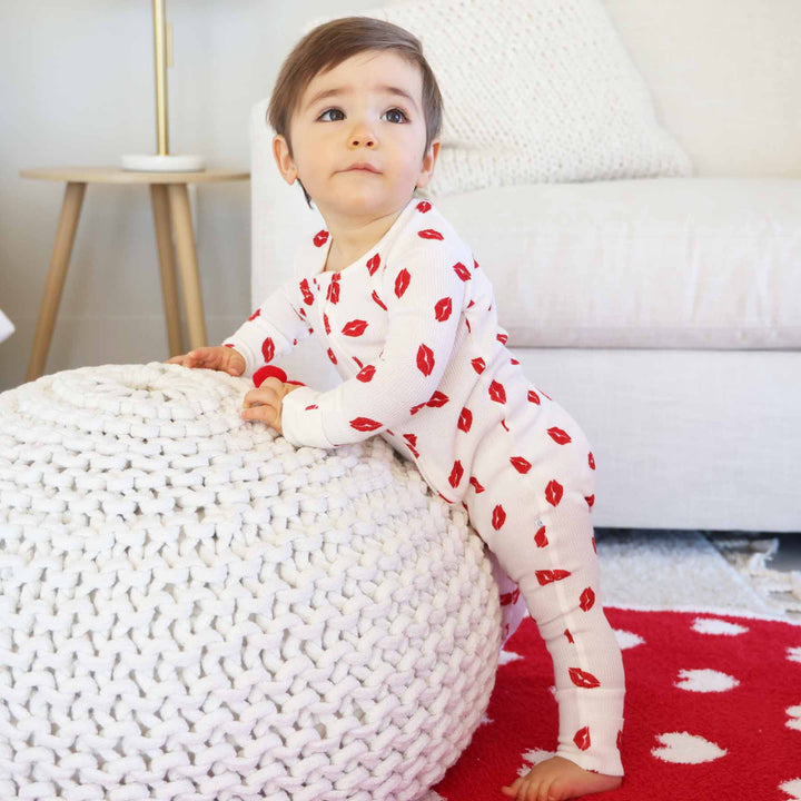 baby boy in red lip convertible zip romper pajama for babies and toddlers