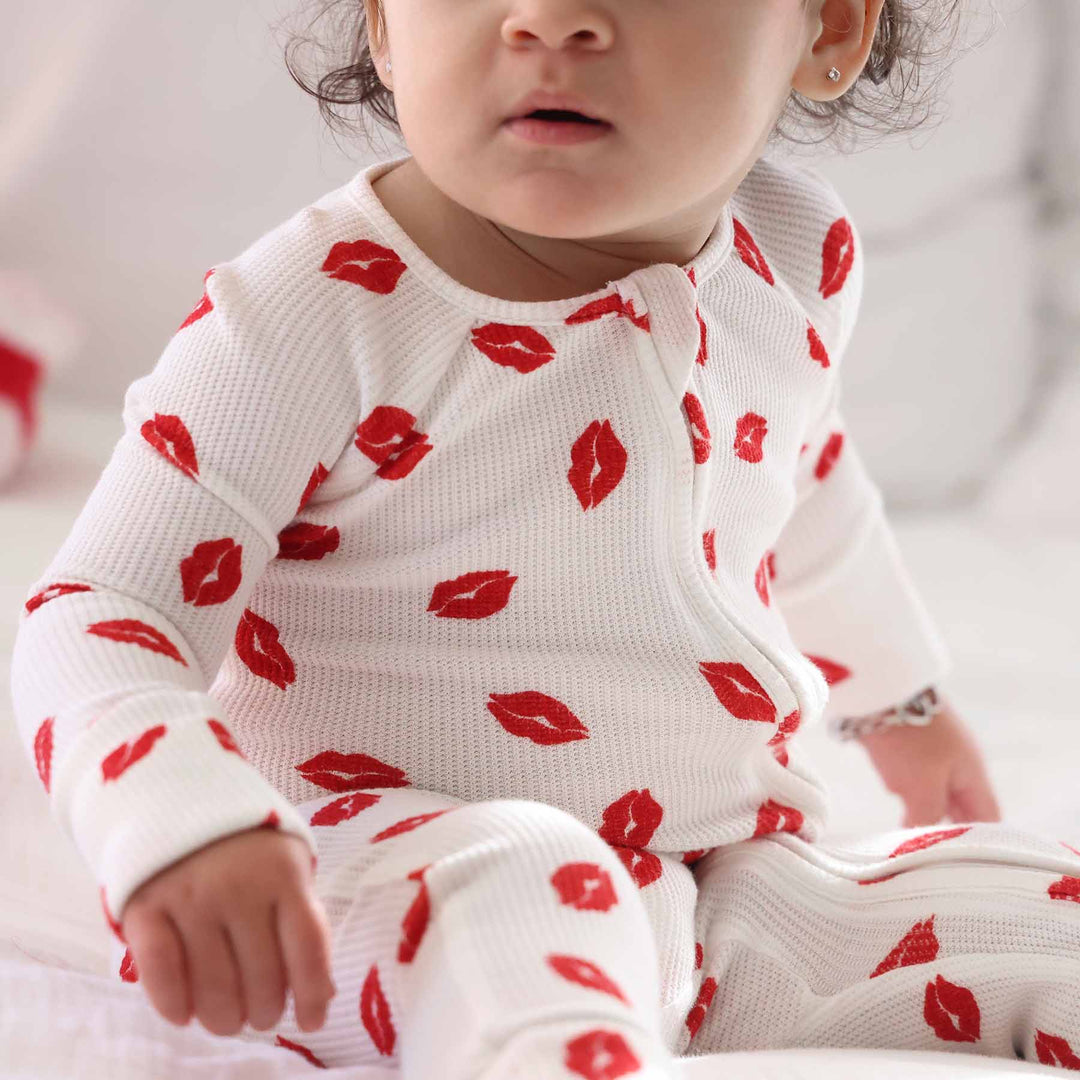 closeup of little kisses bamboo waffle knit convertible zip romper pj