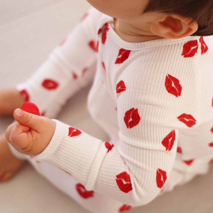 closeup of little kisses convertible zip romper pajama 