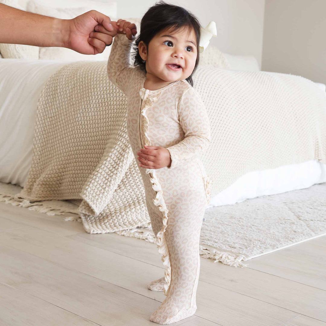 tan leopard print long sleeve footie pajama for baby girls 