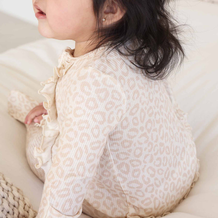 leopard spots ruffle bottom footie baby pj