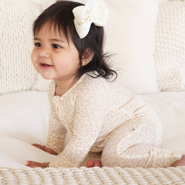 neutral leopard pajama romper for babies and toddlers
