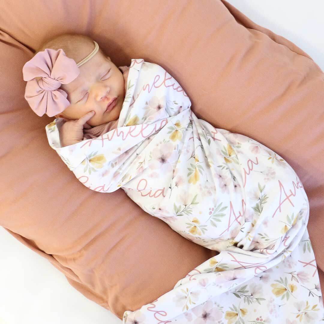 muted floral personalized swaddle blanket 