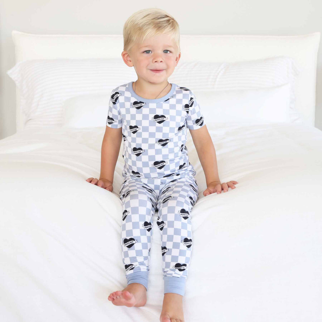 dusty blue and white checkered two piece pajama set for boys with black hearts