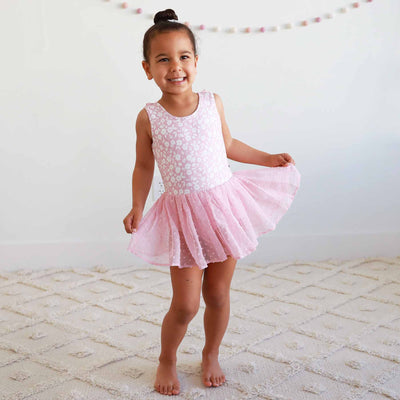 pink tutu leotard with white flowers and dots on skirts 