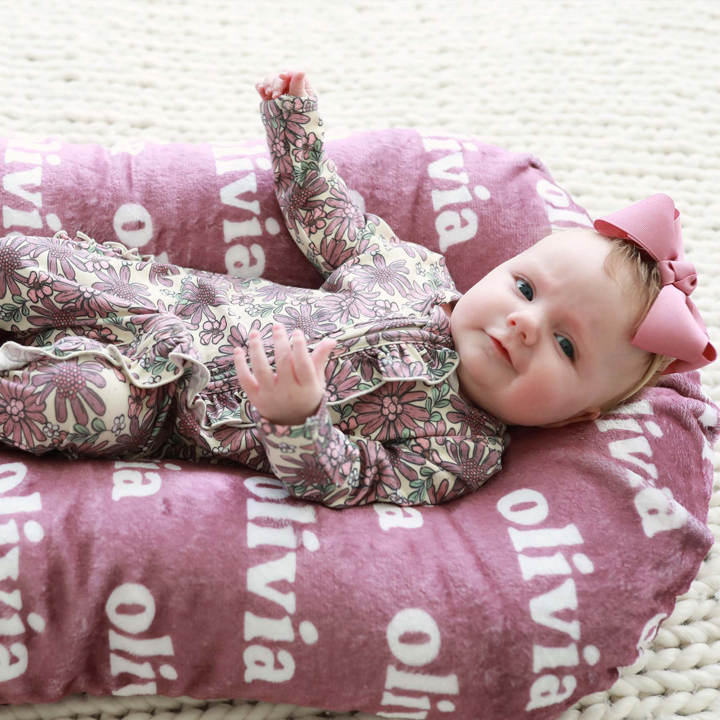 baby pajama footie with purple flowers