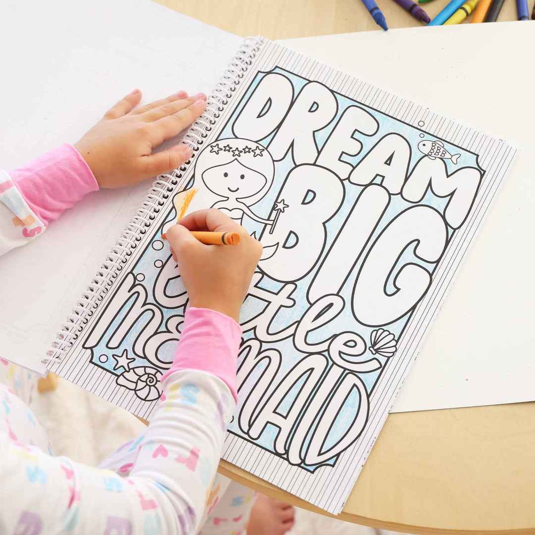 mermaid themed personalized coloring book for girls with page that says "dream big little mermaid"