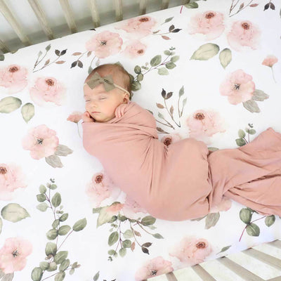 pink floral printed crib sheet 