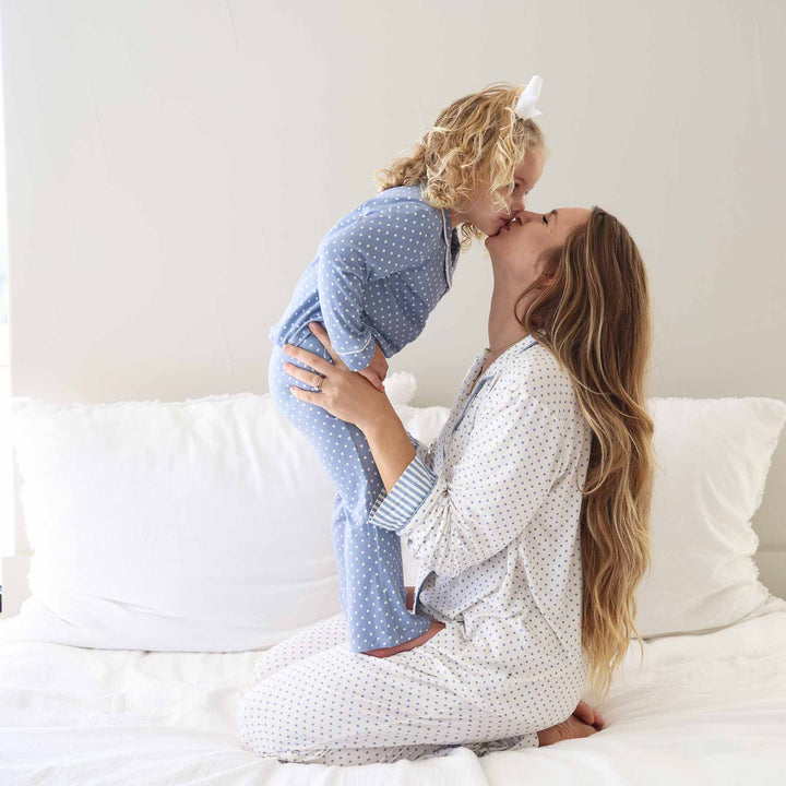 mom and daughter matching polka dot lounge sets with flare pants and long sleeve in inverted colors 