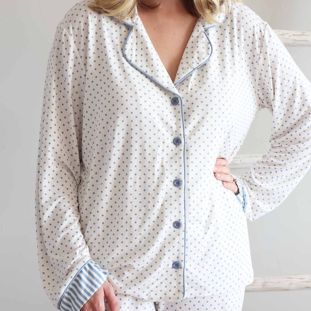 women's long sleeve flare lounge set with with blue polka dots with stripe detailing at the bottom of the sleeves 