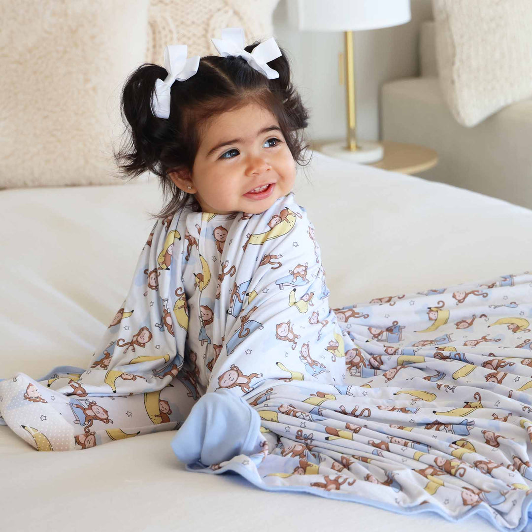 monkey see, monkey snooze double sided bamboo blanket for toddlers and kids 