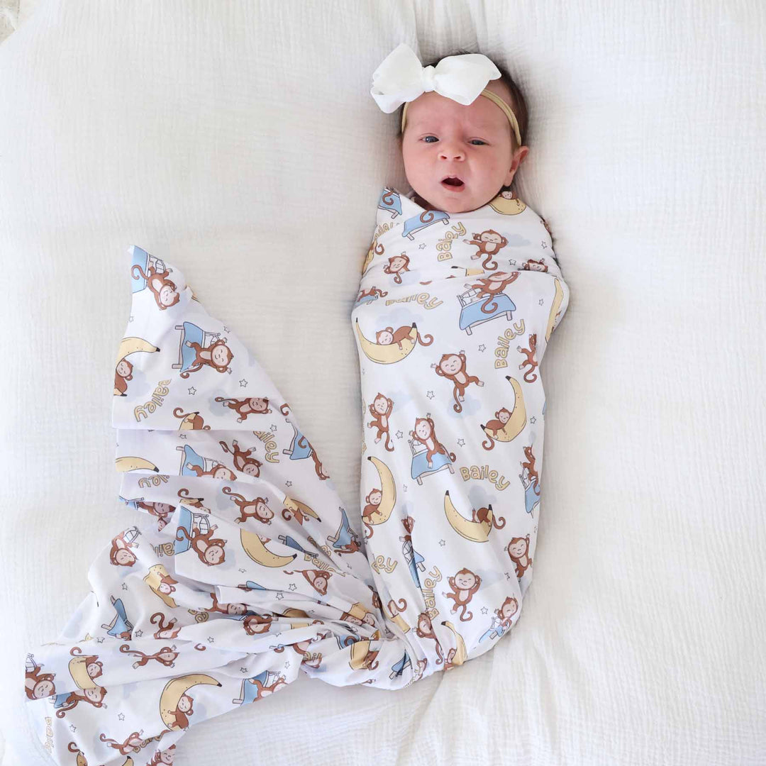 sleeping monkey gender neutral personalized swaddle blanket for newborns 