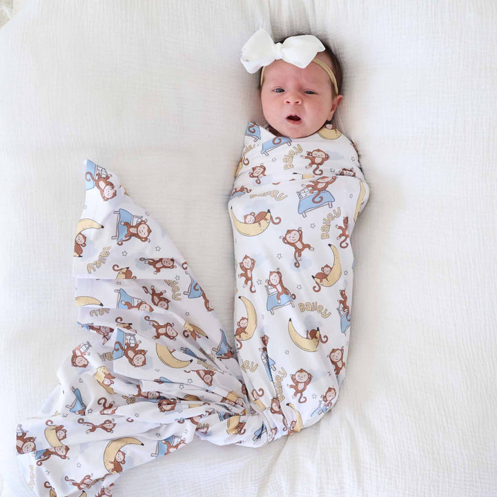 sleeping monkey gender neutral personalized swaddle blanket for newborns 