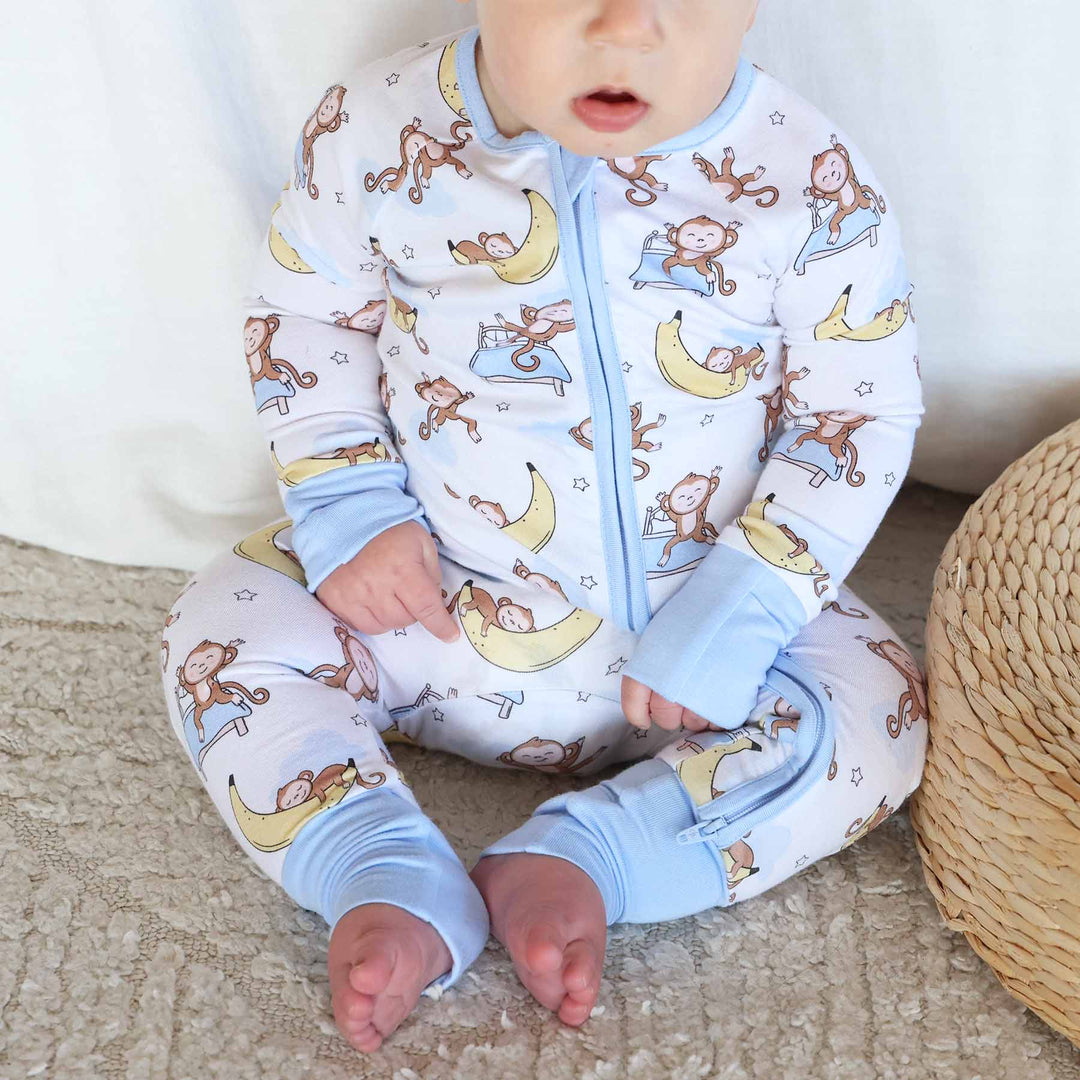 monkey see zip romper pajama blue, yellow, white and brown 