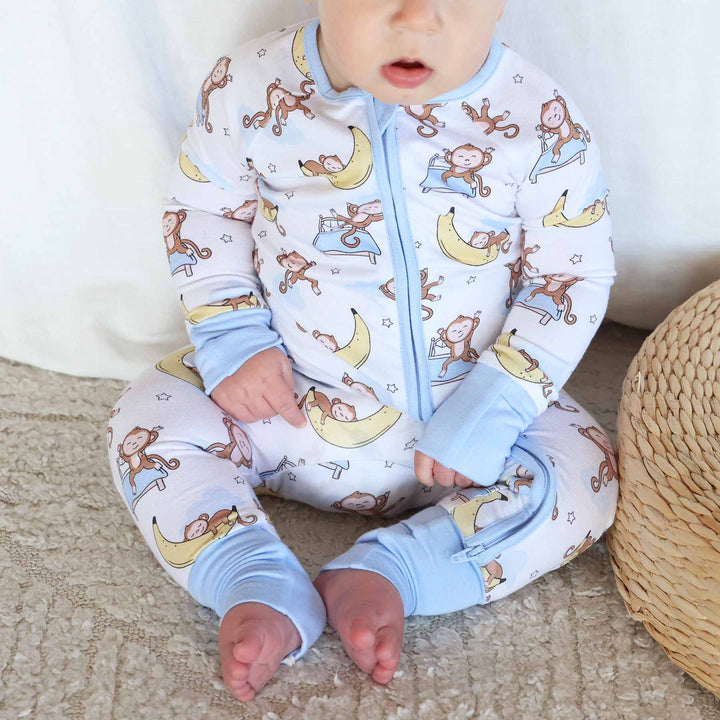 monkey see zip romper pajama blue, yellow, white and brown 