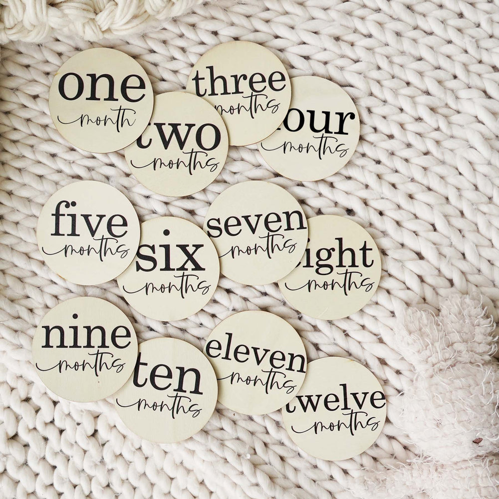 monthly milestone wood announcement with modern font 